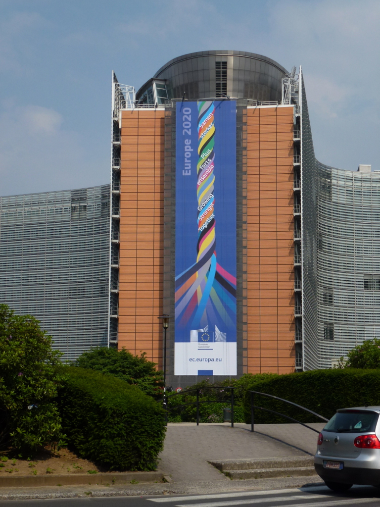 a building with an advertit of a colorful design on it's side