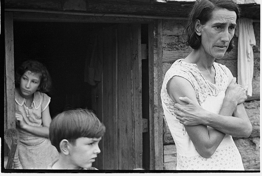 an old po of a young man with his arm crossed