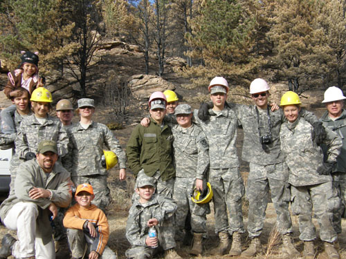 a group of military people posing for a po