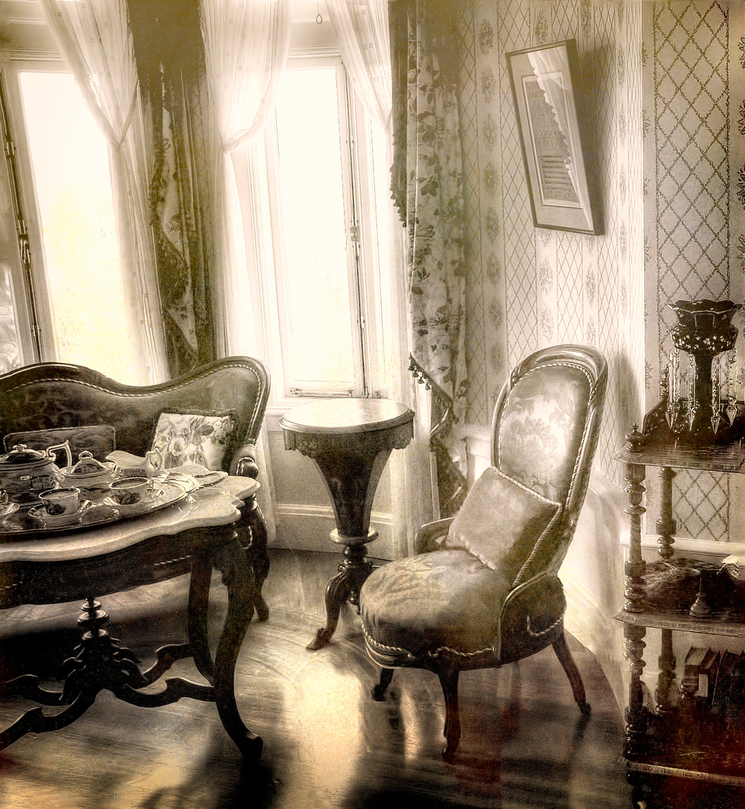 this is an old fashioned room with fancy furnishings