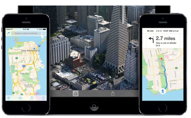 two iphones displaying google maps with a cityscape in the background