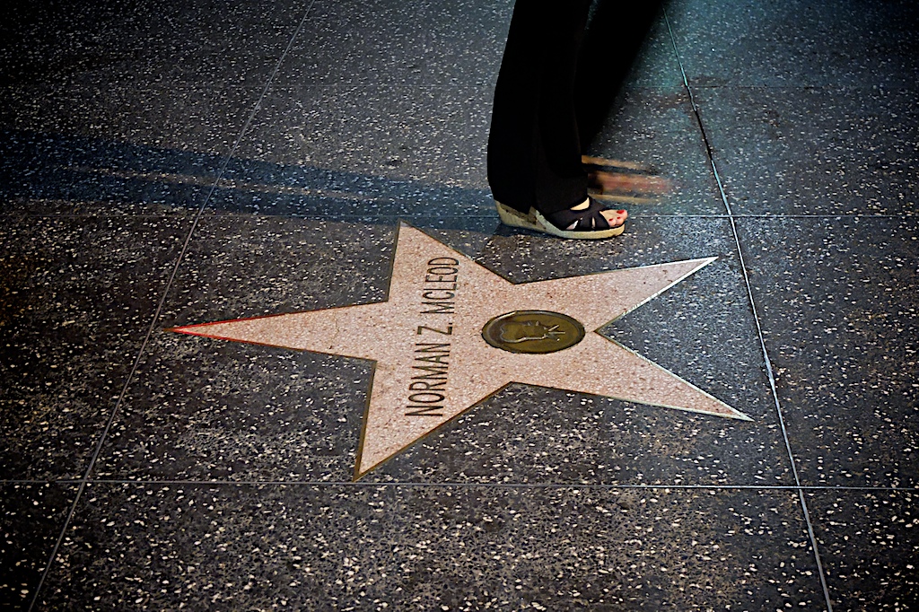 a close up of the star of hollywood on the sidewalk