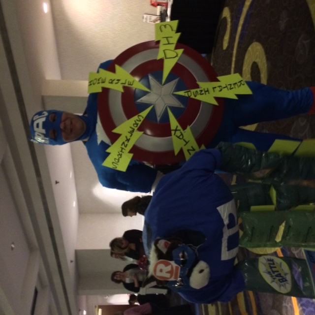 a couple of men in captain america costumes