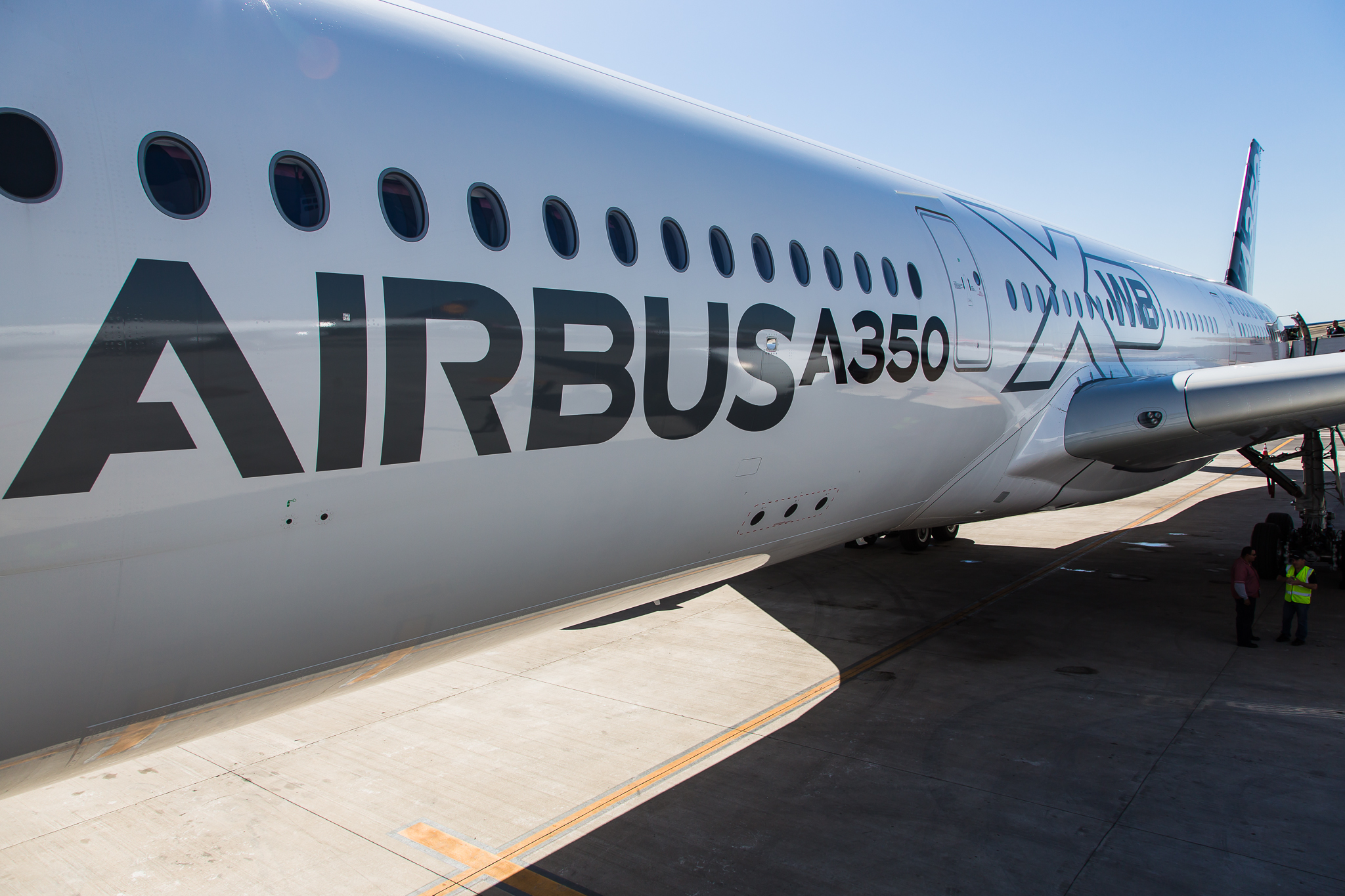 the front of an airplane with people on it