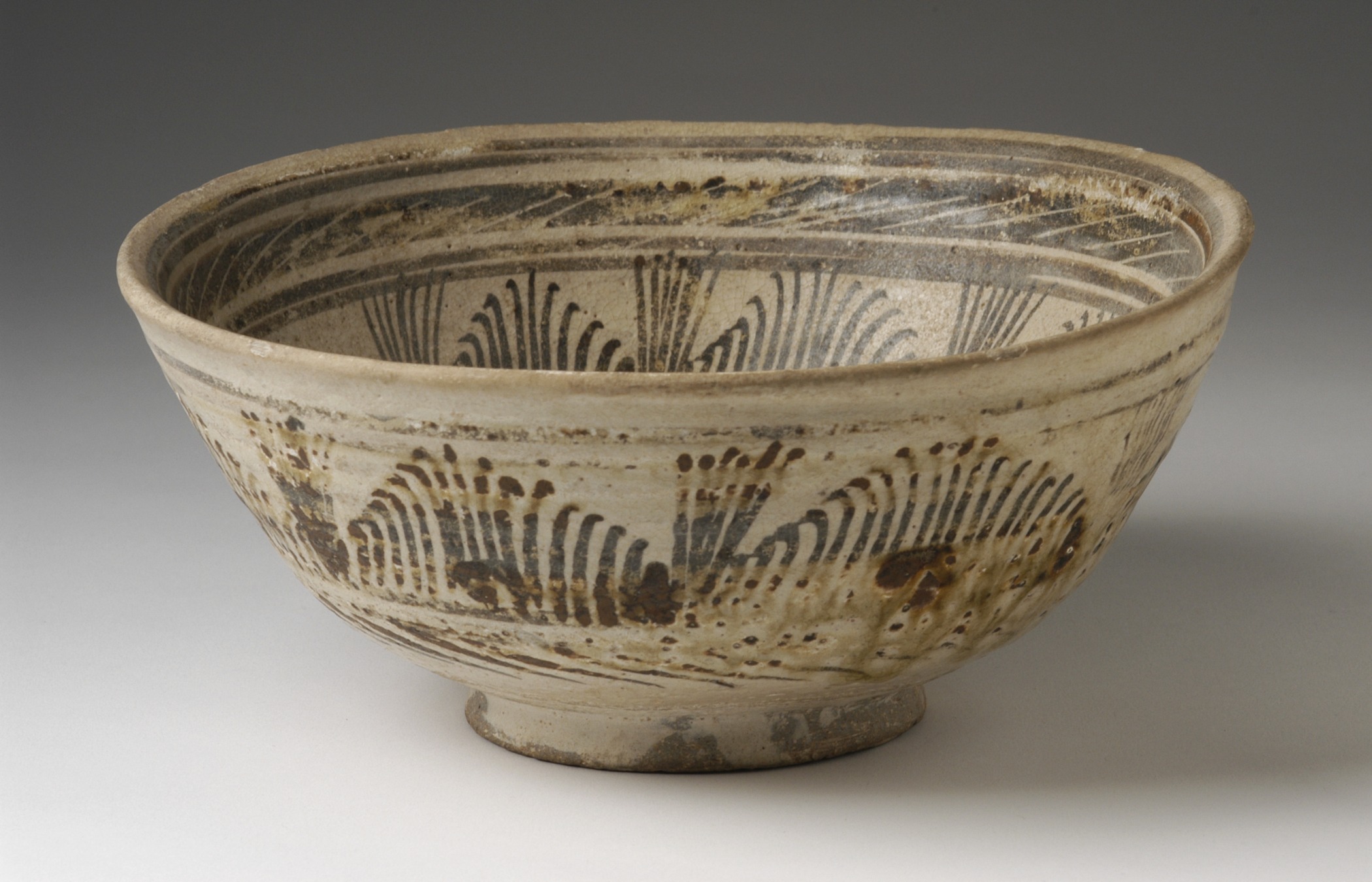 a bowl is shown with a white surface