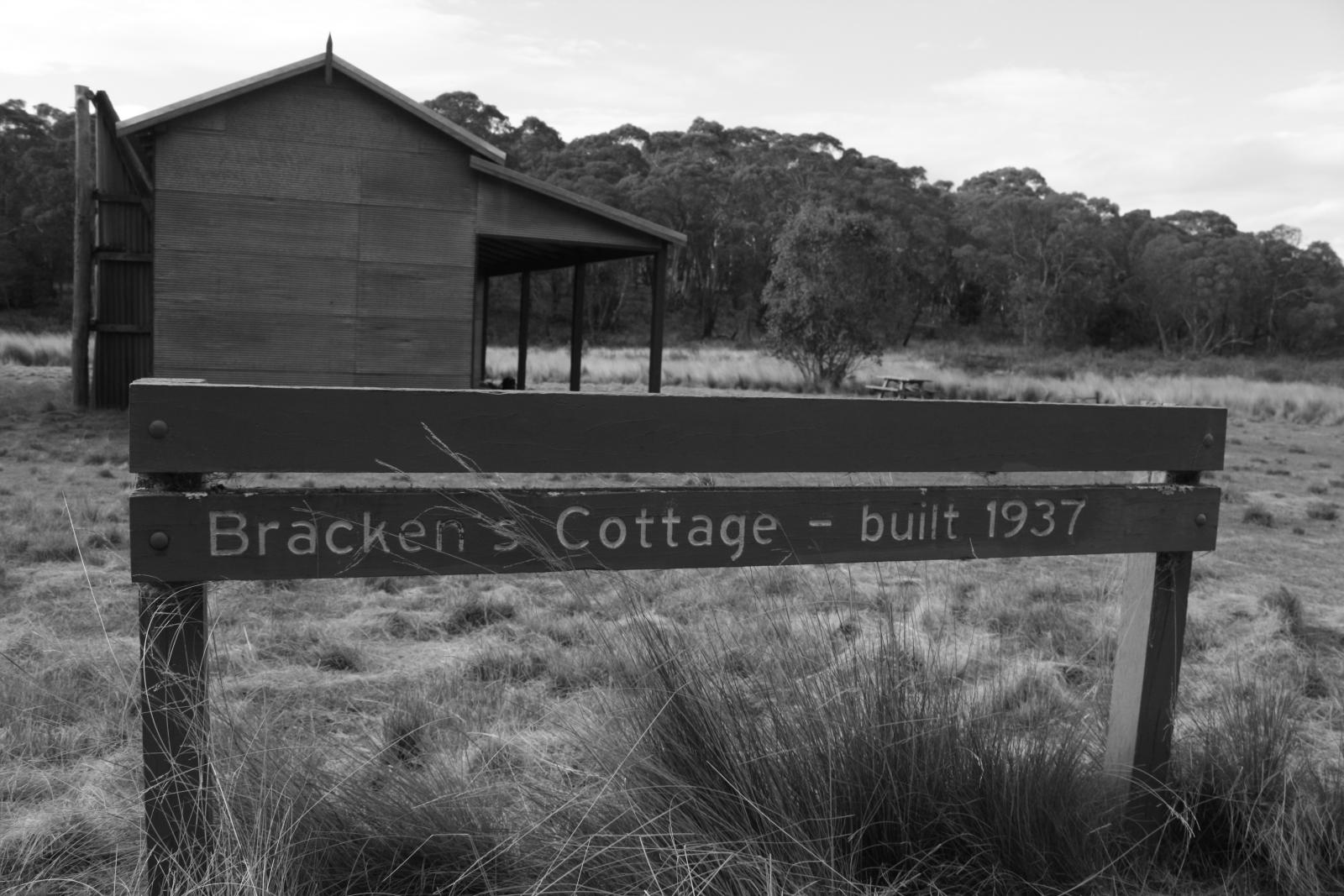 an old sign saying ch cottage built 1917