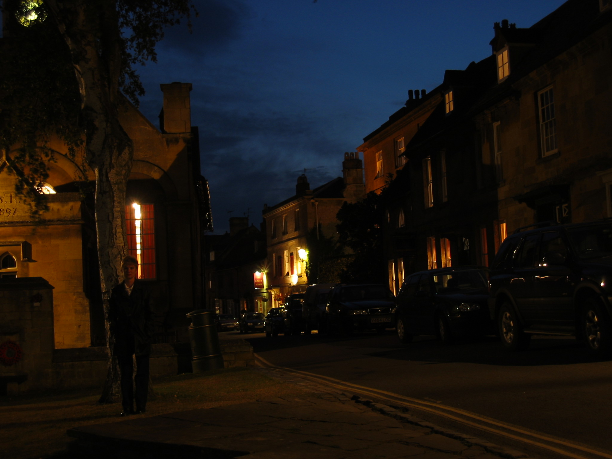 a busy street at night in the city