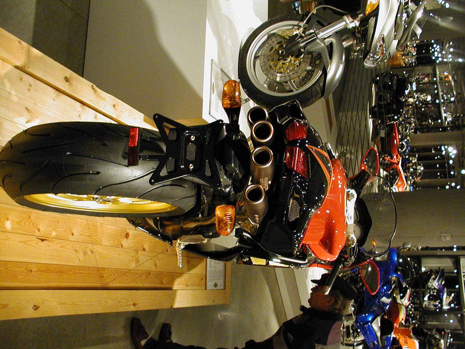 a motorcycle with motor wheels is attached to the wall