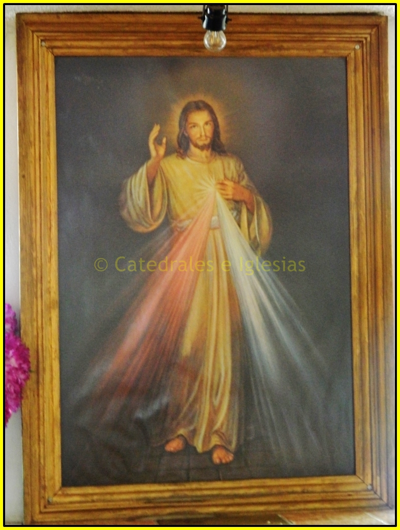 a painting of jesus with sunlight coming through it