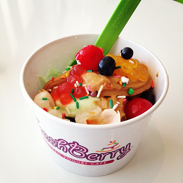 a colorful bowl filled with lots of toppings