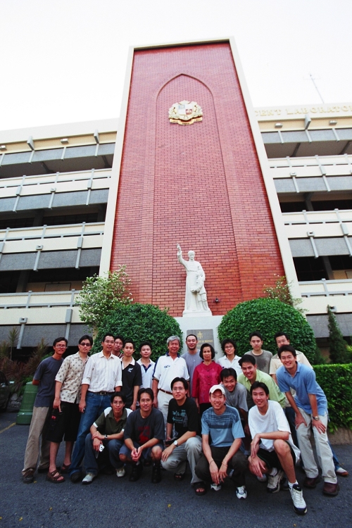 a group of people in front of a building