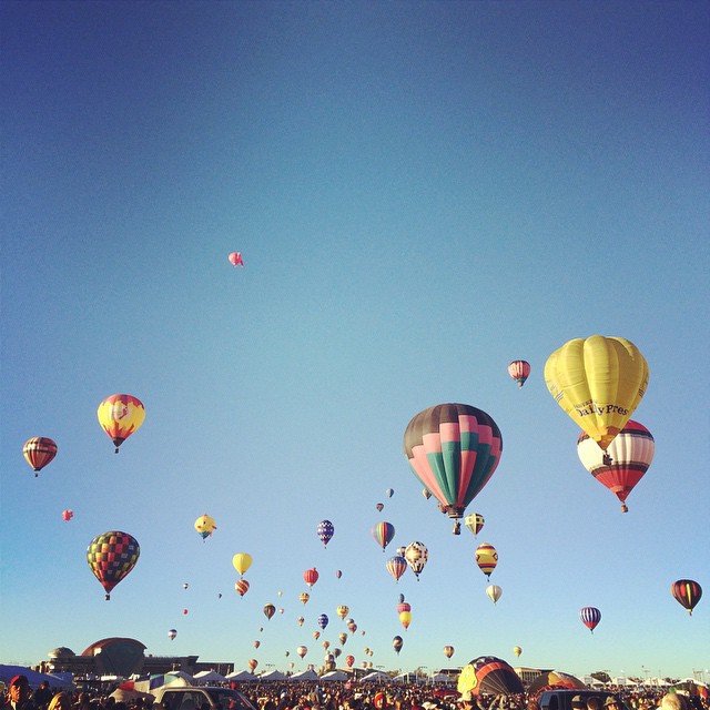 many colorful  air balloons flying in the sky