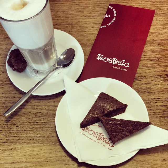 a close up of two desserts on plates on a table