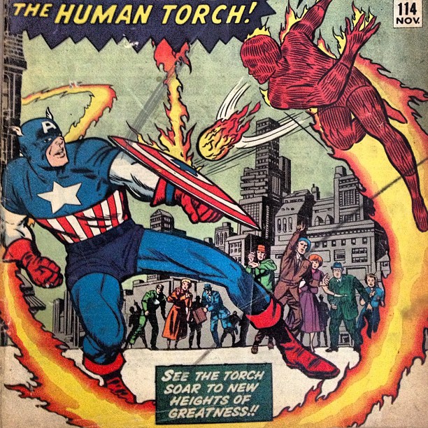 comic book cover with an image of the captain flying through the air