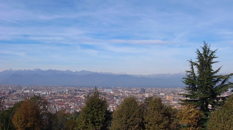mountains in the distance with a city on one side