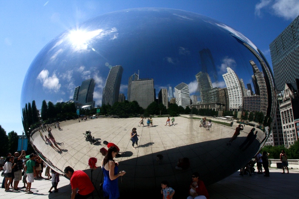 a large group of people on the ground in a circular area