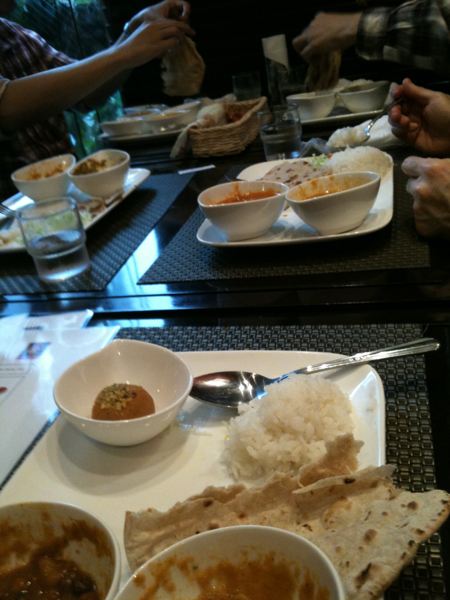 a plate full of rice, curry and curry powder