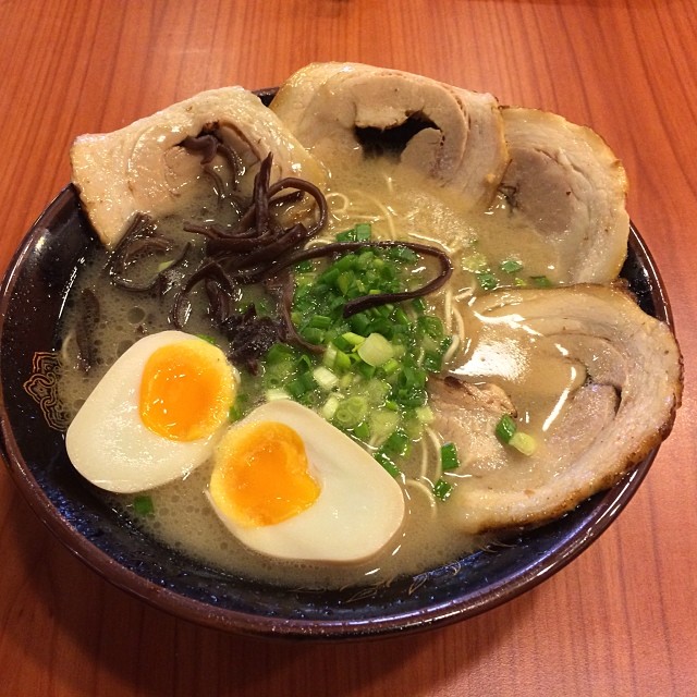 a bowl of ramen with eggs and noodles
