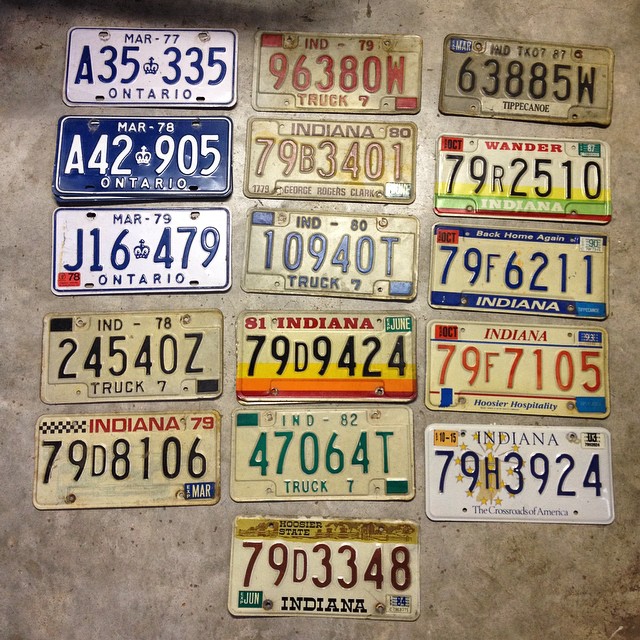 a large assortment of license plates on display