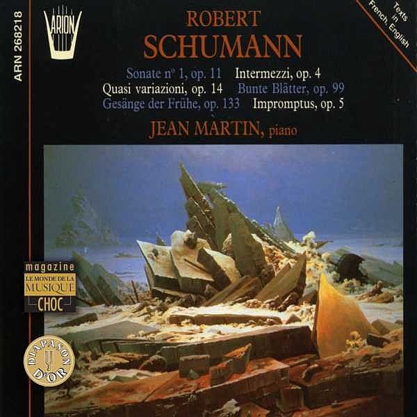 the cover of a cd showing a building, rubble and a pile of rocks