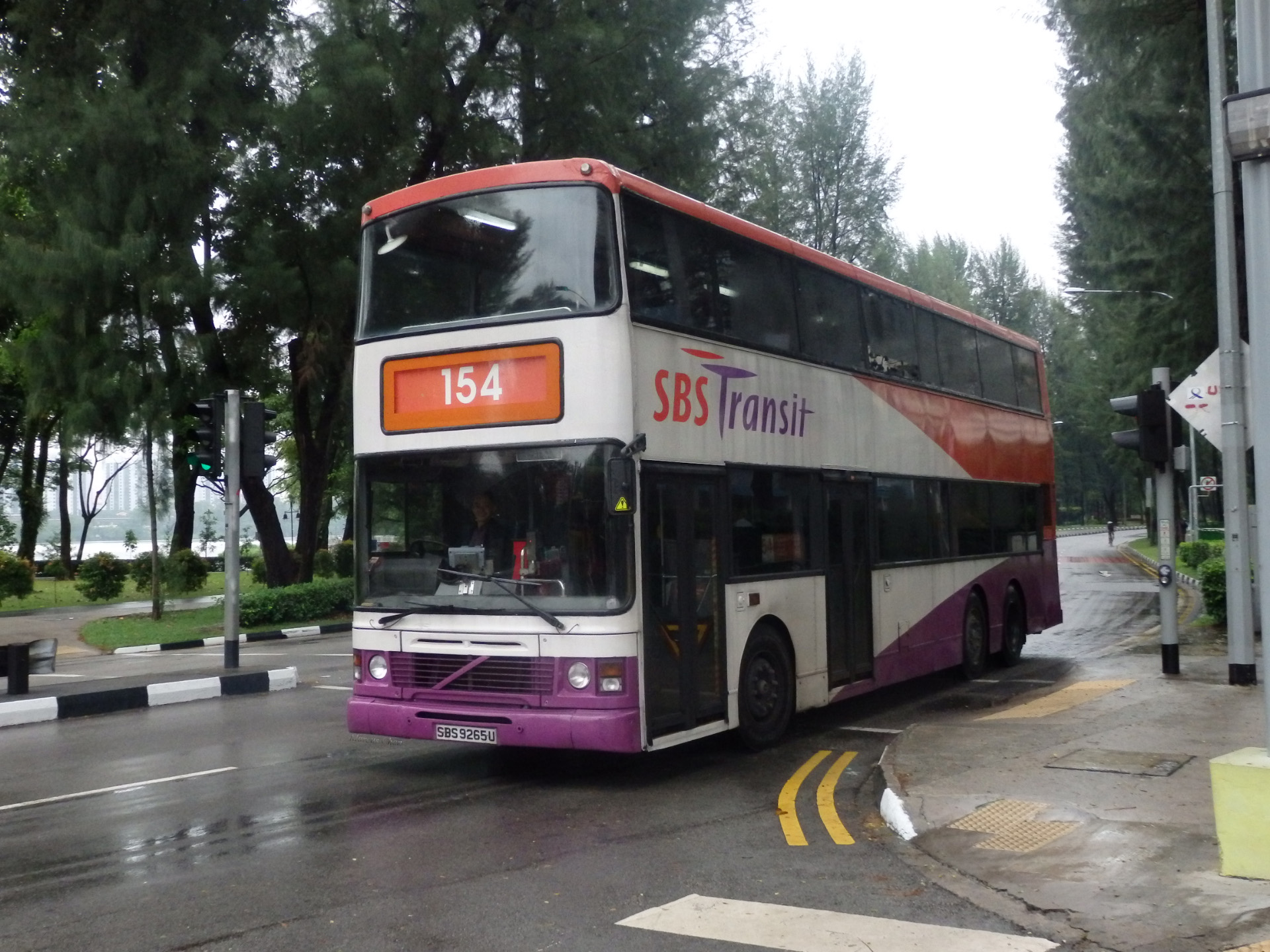 a double decker bus is parked on the side of the road