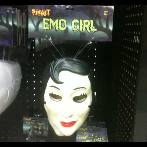 the mask and creepy hair on display are part of the set