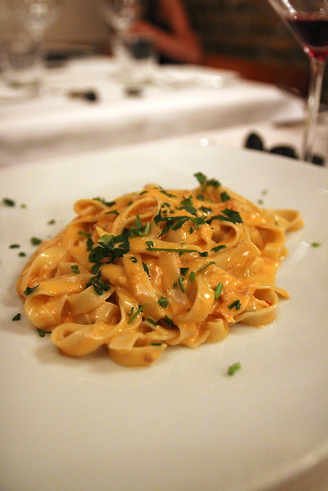 a close up of a plate of food with pasta