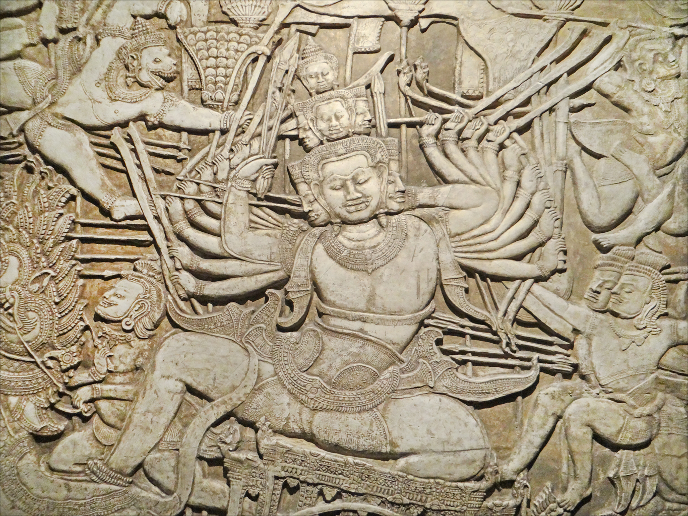 an indian relief with figures from various countries