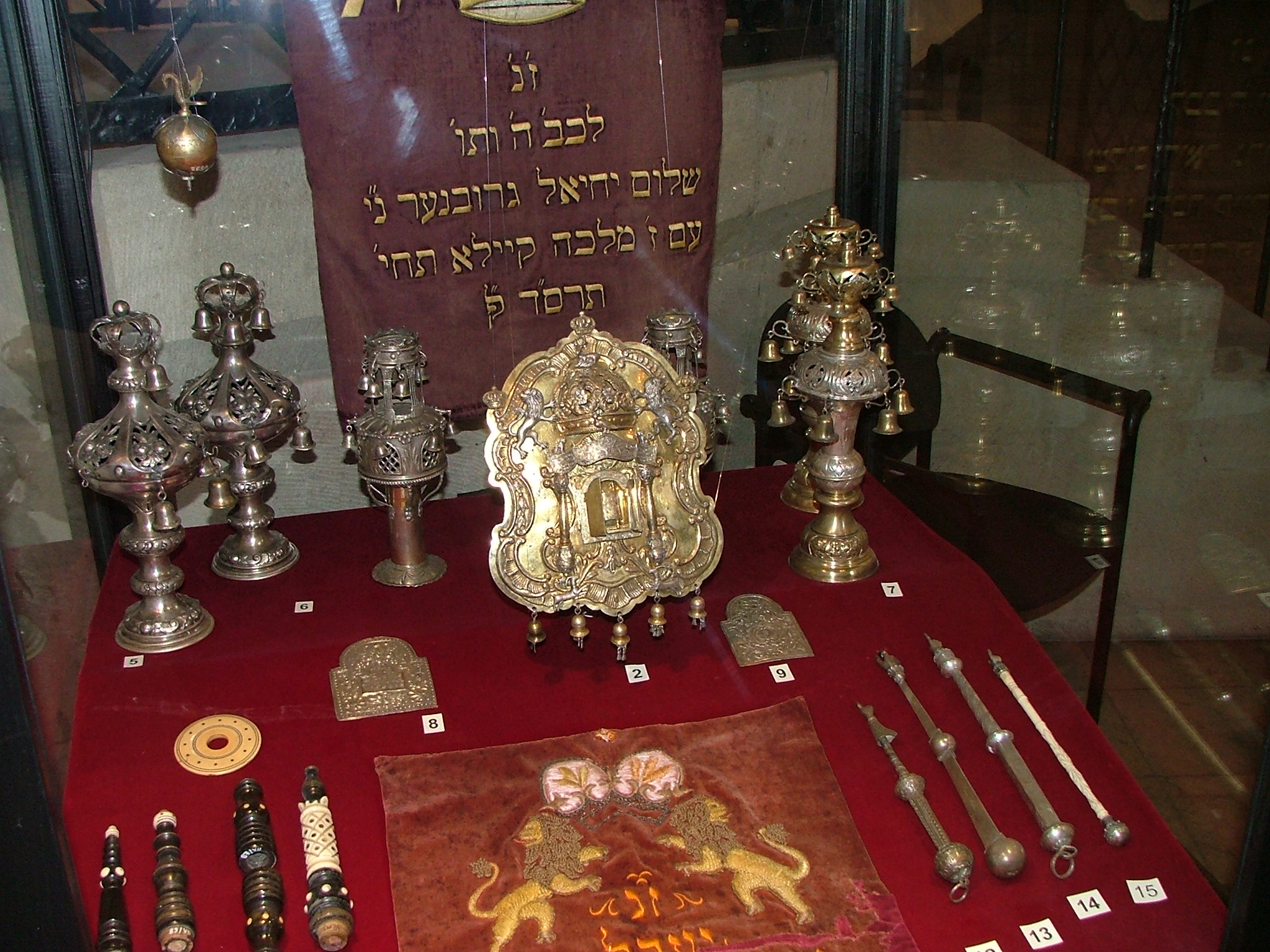 a table covered with various old items and writing