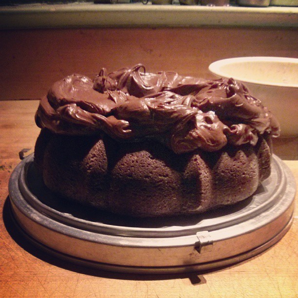 a closeup of a cake with chocolate frosting