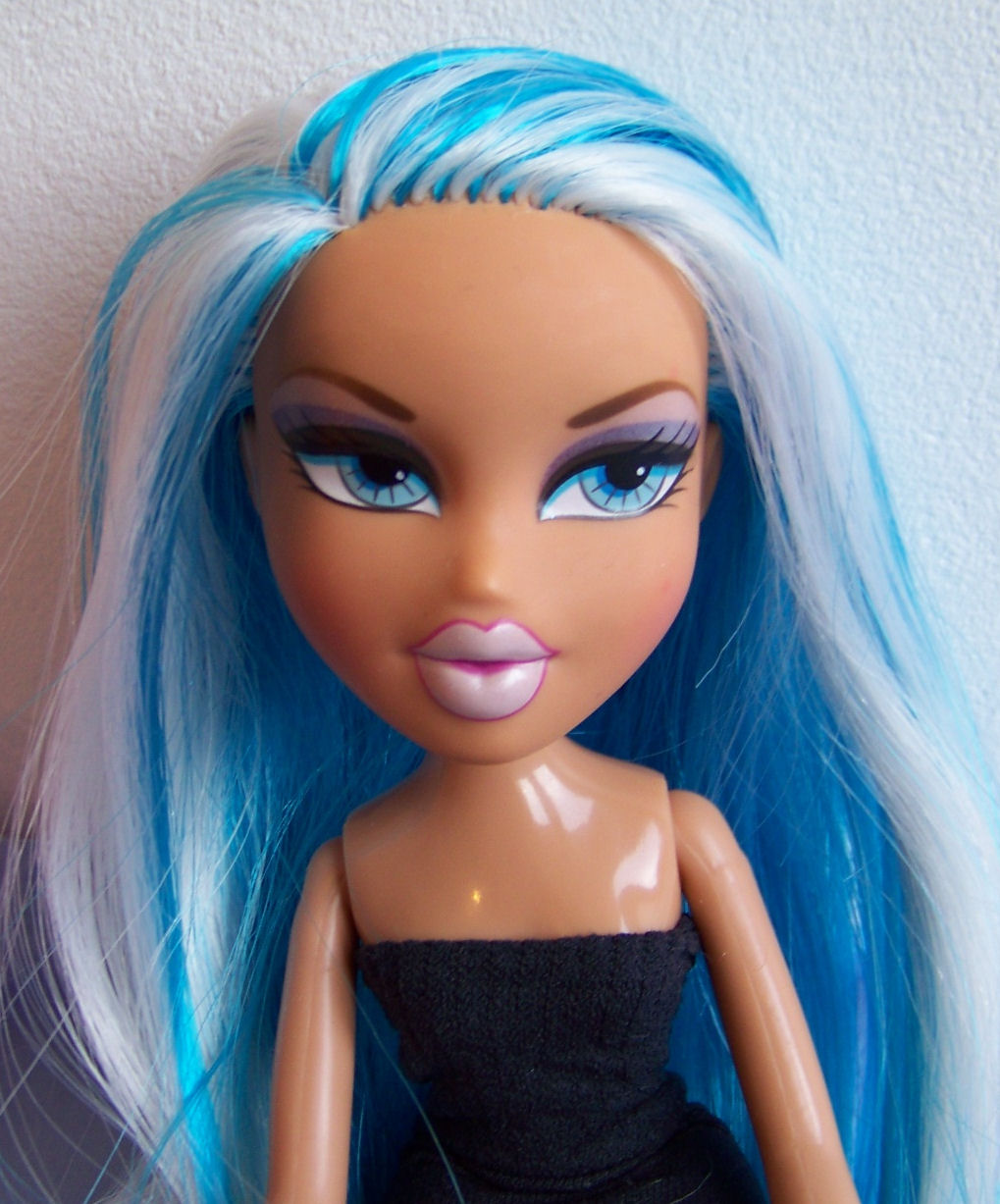 a blue haired girl with bright blonde hair