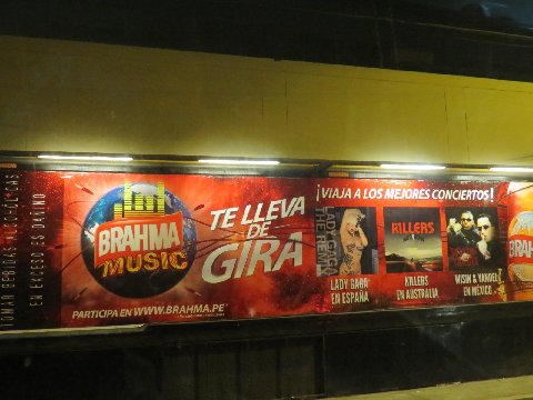 a public bus with various advertits on it