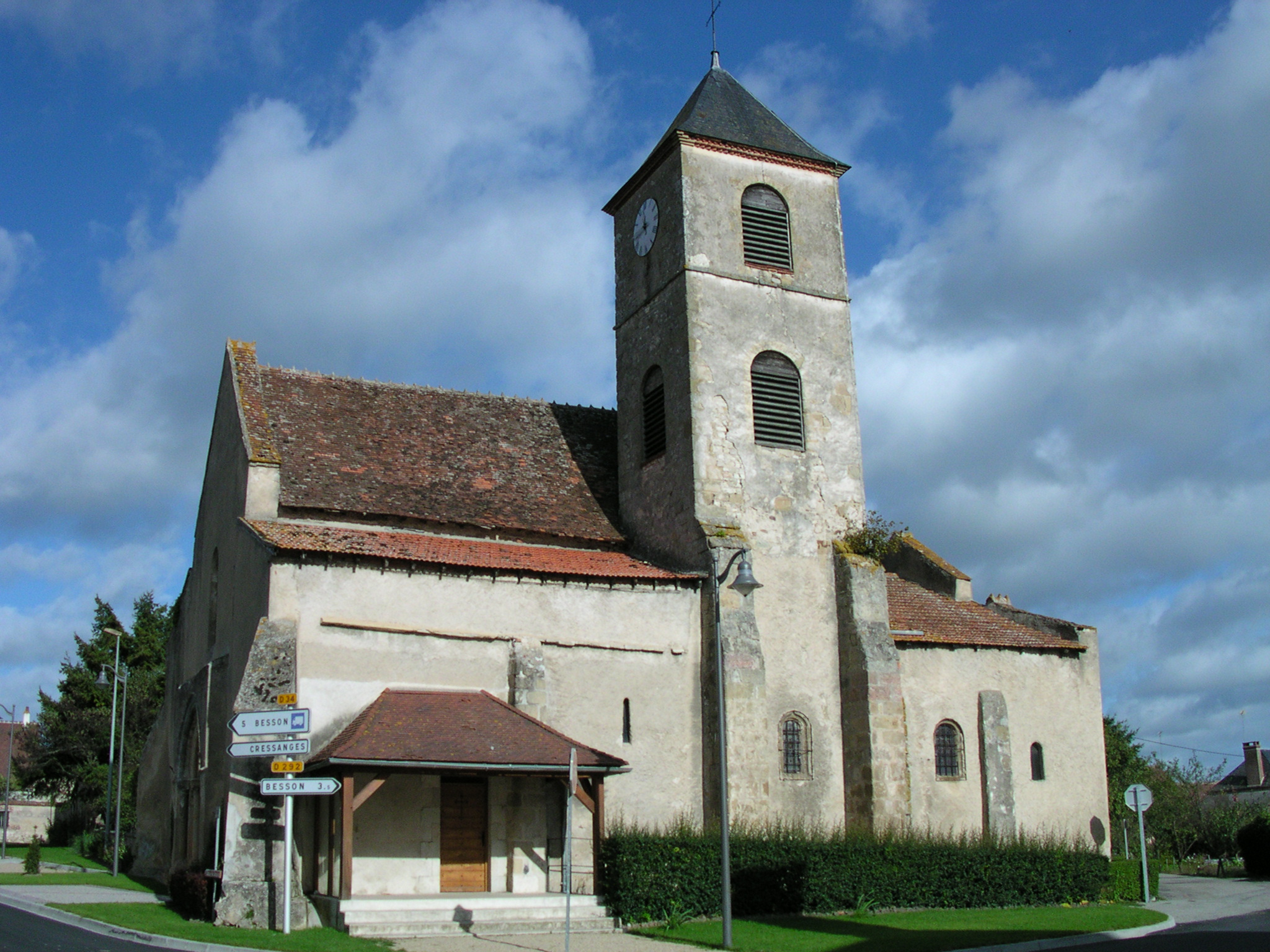 an old church stands on the corner by the street