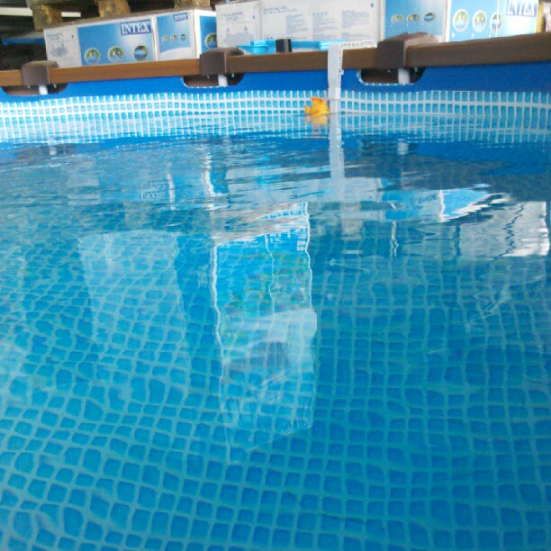 empty swimming pool with boxes attached to it