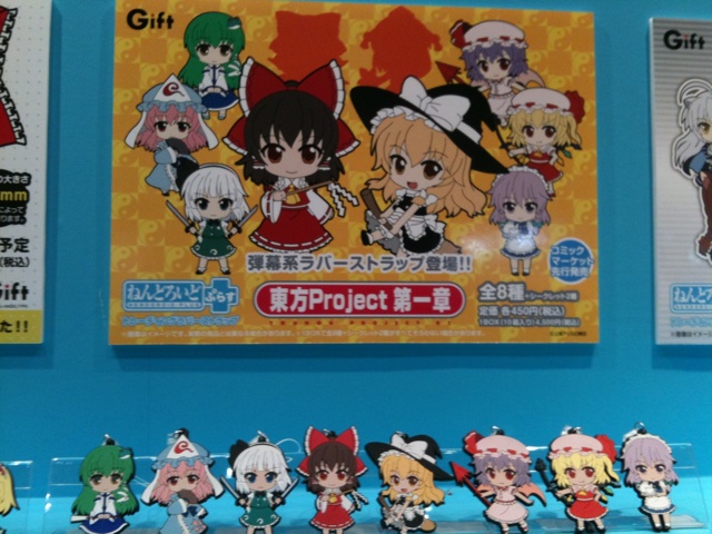 various anime figurines displayed in an assortment of designs