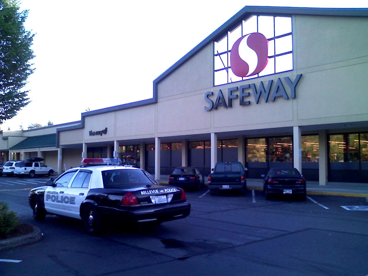 the security car is parked in front of safeway