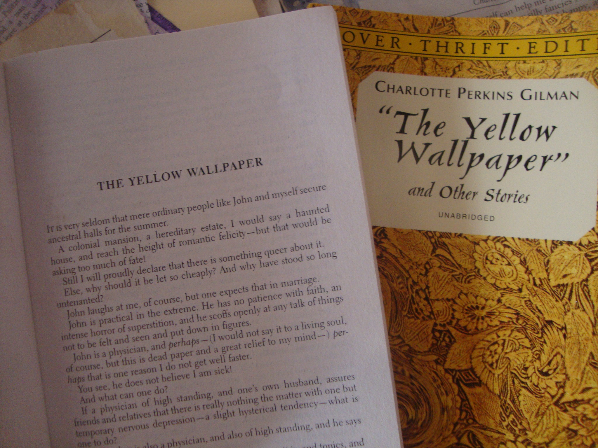a yellow and white book open on top of the page