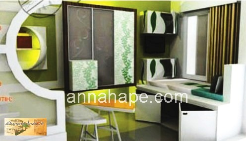 the kitchen has green walls and cabinets