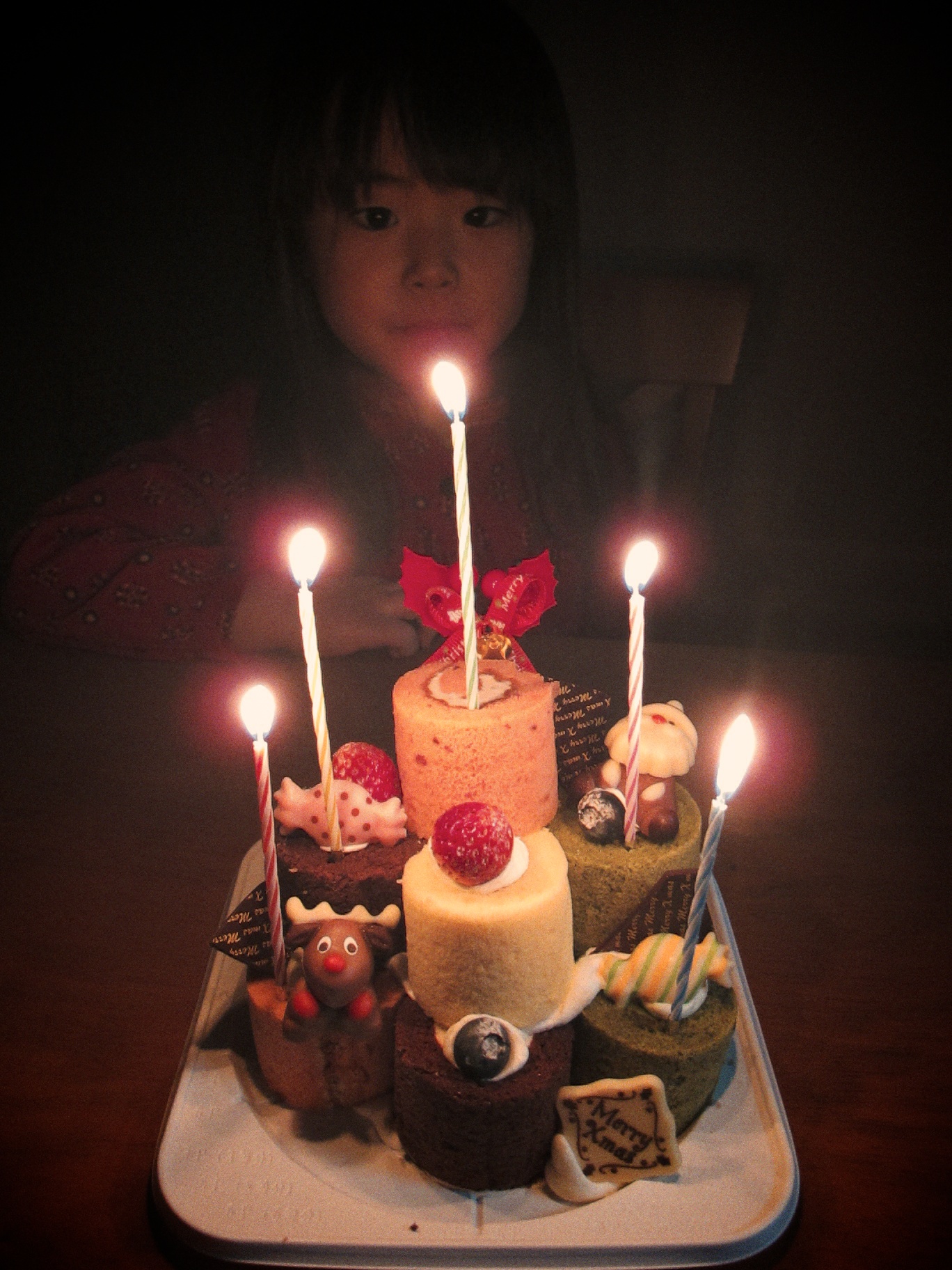 an image of cake with candles set in front