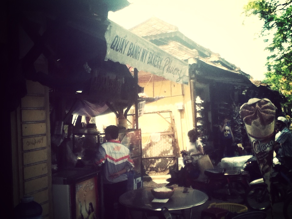 a shop selling outdoor decorations on a city street