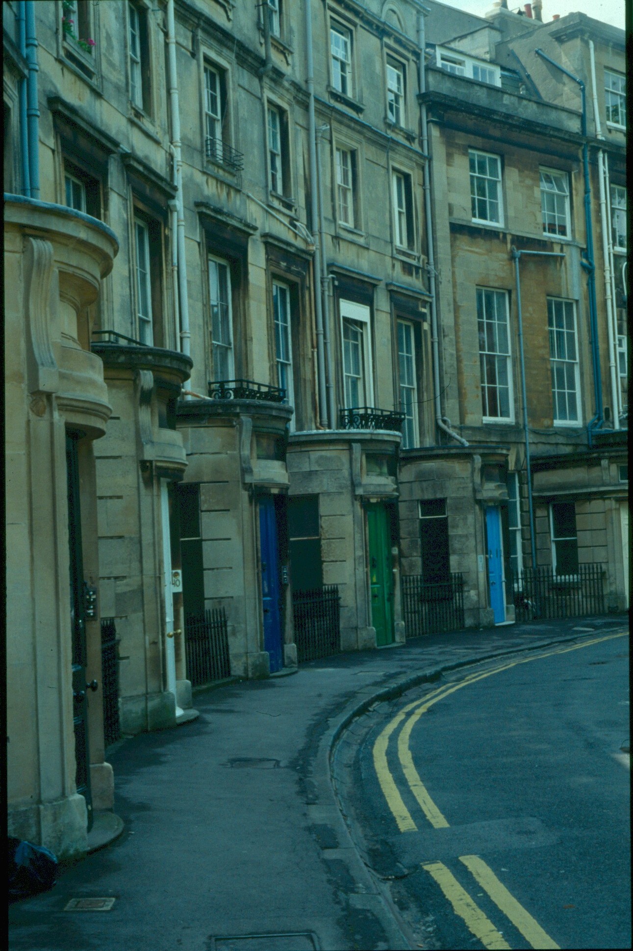 a group of buildings along a narrow street