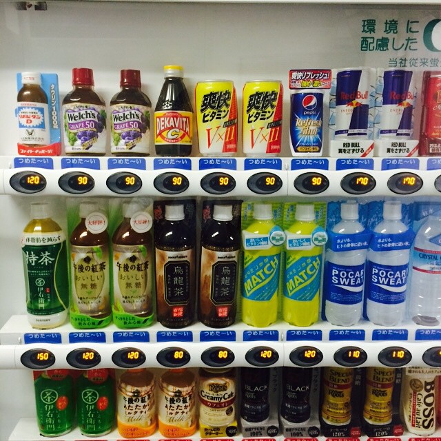 many different kinds of beverages on the shelf