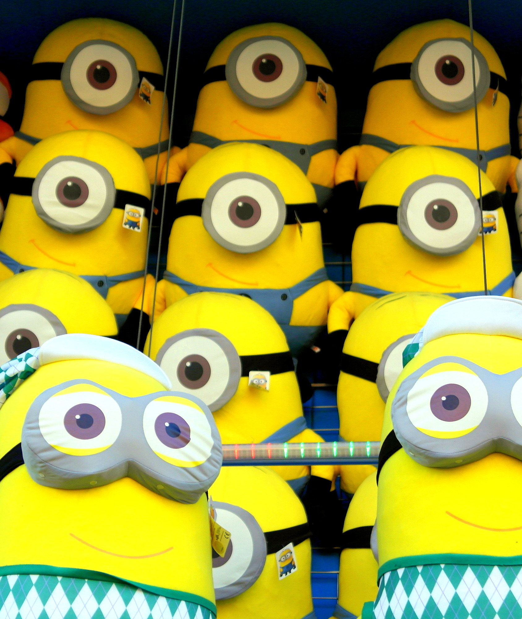 a bunch of yellow cartoon minions with different eyes