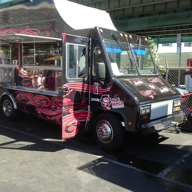 a food truck with a canopy and decorations