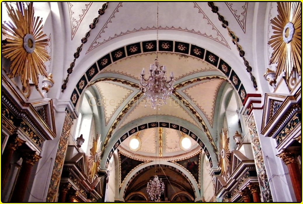 the interior of a church that is very high vaulted