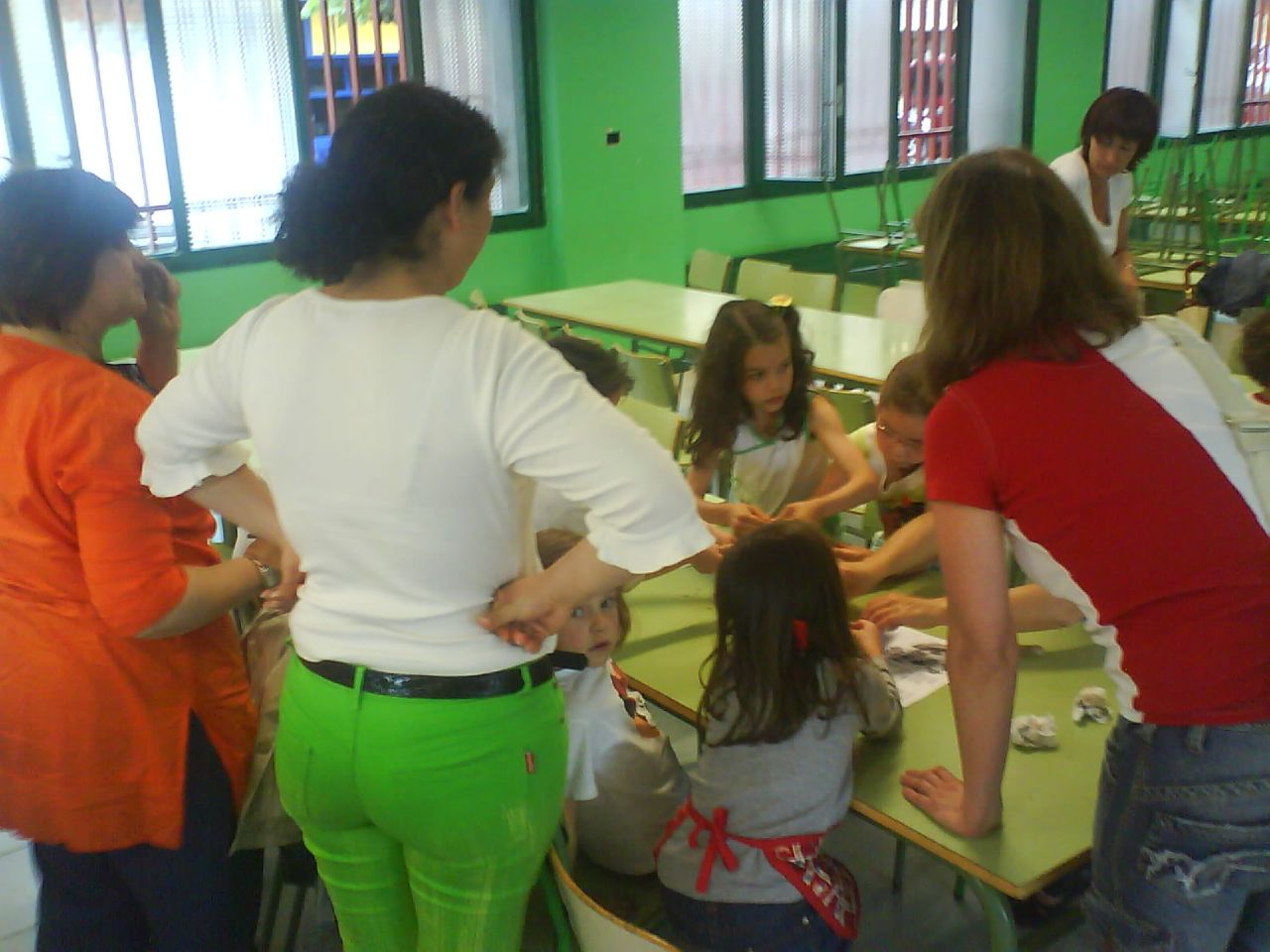 a teacher is teaching students in a classroom