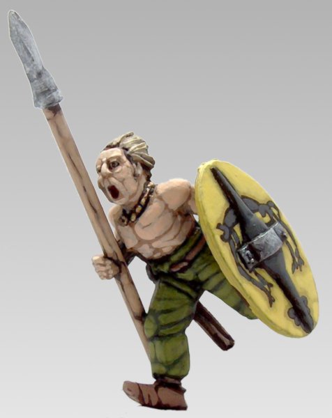 an artistic figurine of a soldier holding a spear and shield