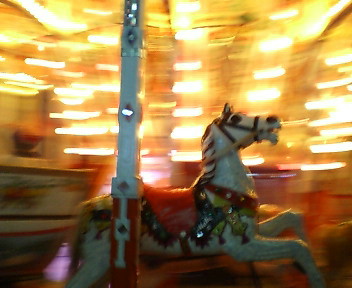 a carousel ride with the horse on it