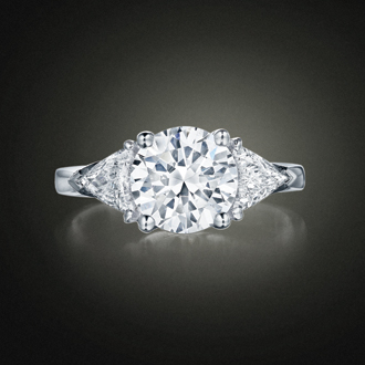 a engagement ring with a diamond on top