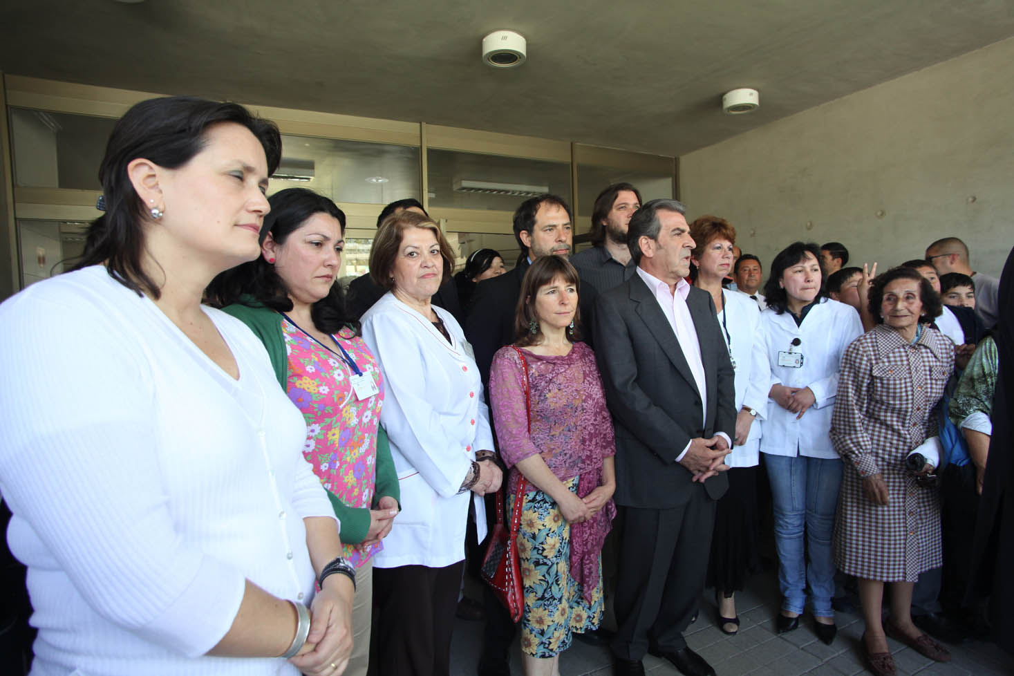 a group of people standing in a room